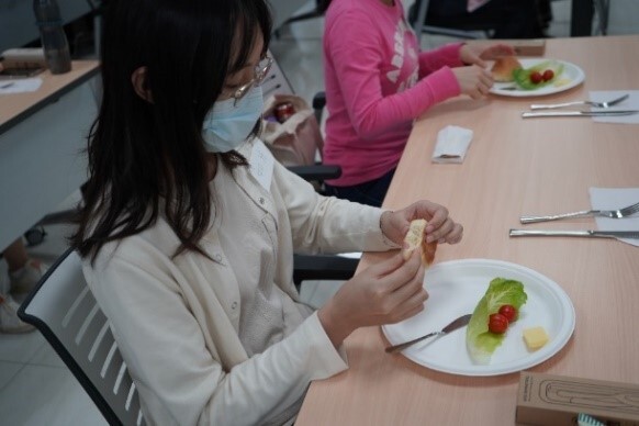 Figure 12. Students simulating dining etiquette