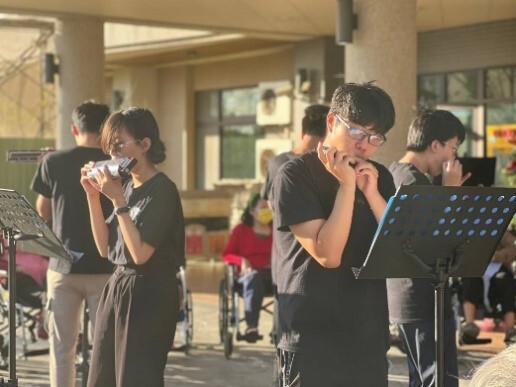 Figure 22. Harmonica Club's Achievement Presentation