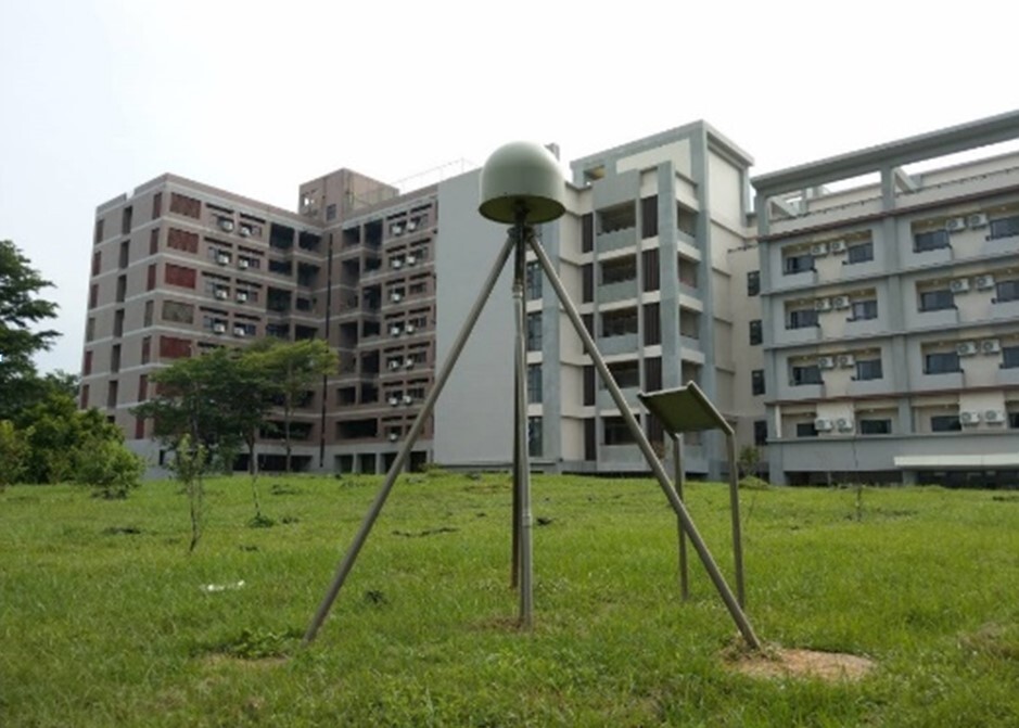 Figure 2. Crustal deformation observation station in Baoshan Campus. The station continuously receives signals emitted from the global satellite positioning system and, with the signals received simultaneously by other stations, it can accurately calculate its location relative to other stations. Long-term observation data can reflect significant surface displacement due to major earthquakes. In addition, data on small crustal deformation during earthquakes are very helpful in understanding crustal movement and earthquake potential