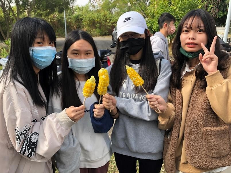 Figure 5. Students harvested and cooked corns on site