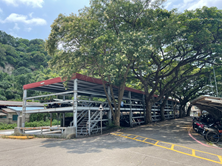 Multi-story motorcycle parking tower at the west side entrance of NCUE