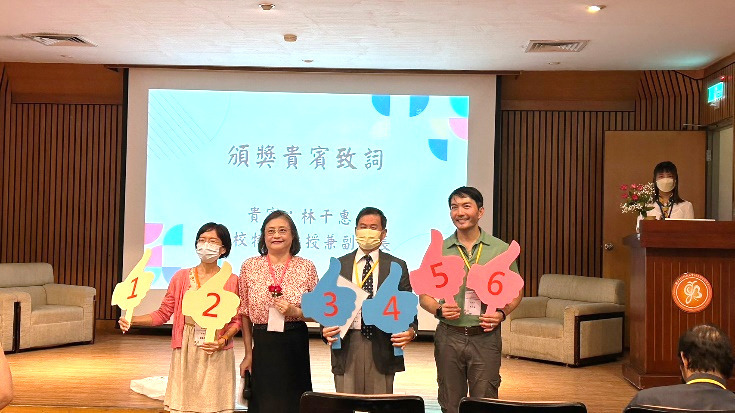 Figure 12: Group photo of Vice President Lin Chien-hui (second from left) with Department Chair Lo Chia-ling (far left), Professor Lin Ching-wen (second from right), and Associate Professor Wu Ming-fu (far right)