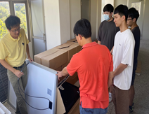 Teacher leading students in solar power generation training