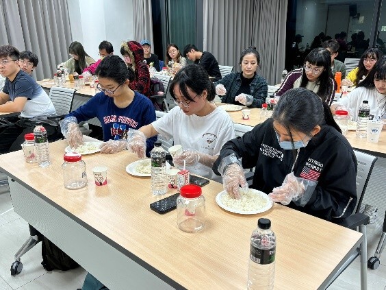 Figure 1. Students Learning the Brewing Process