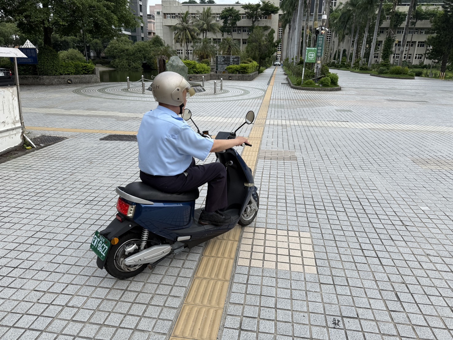 Figure 11. Security Team Riding Electric Patrol Motorcycle at Jinde Campus