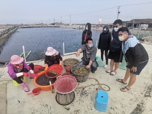 Water quality team interviewing the local farmers on fish farms